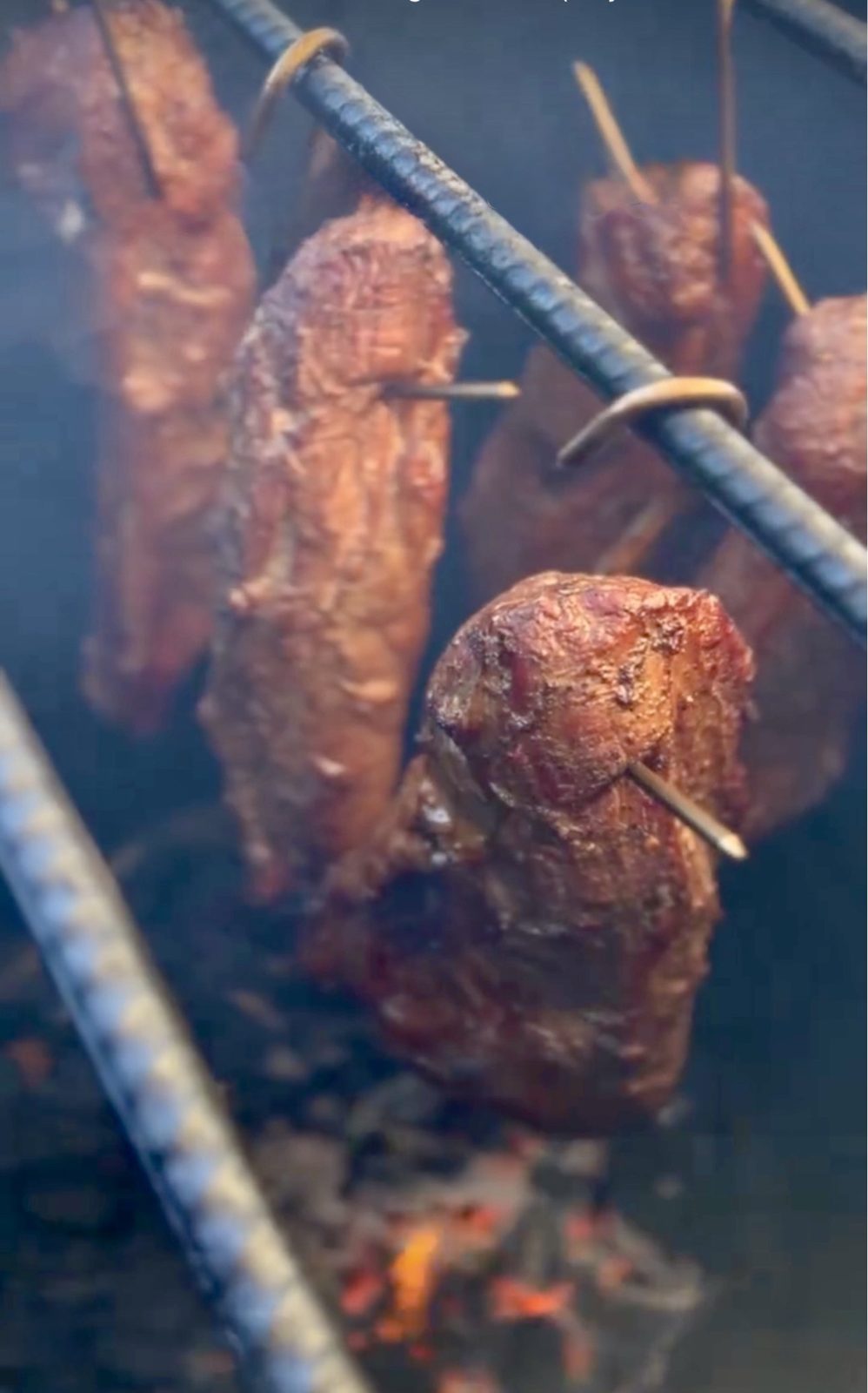 Meats hanging in the smoker