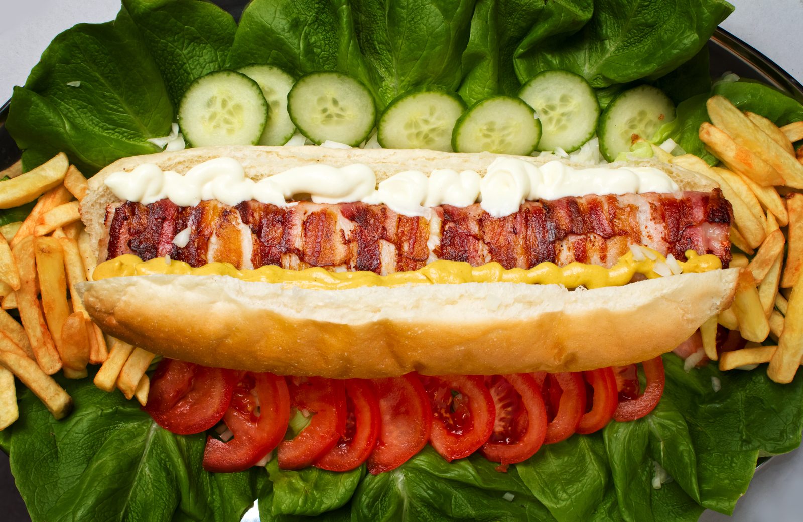 Bacon-wrapped street dog